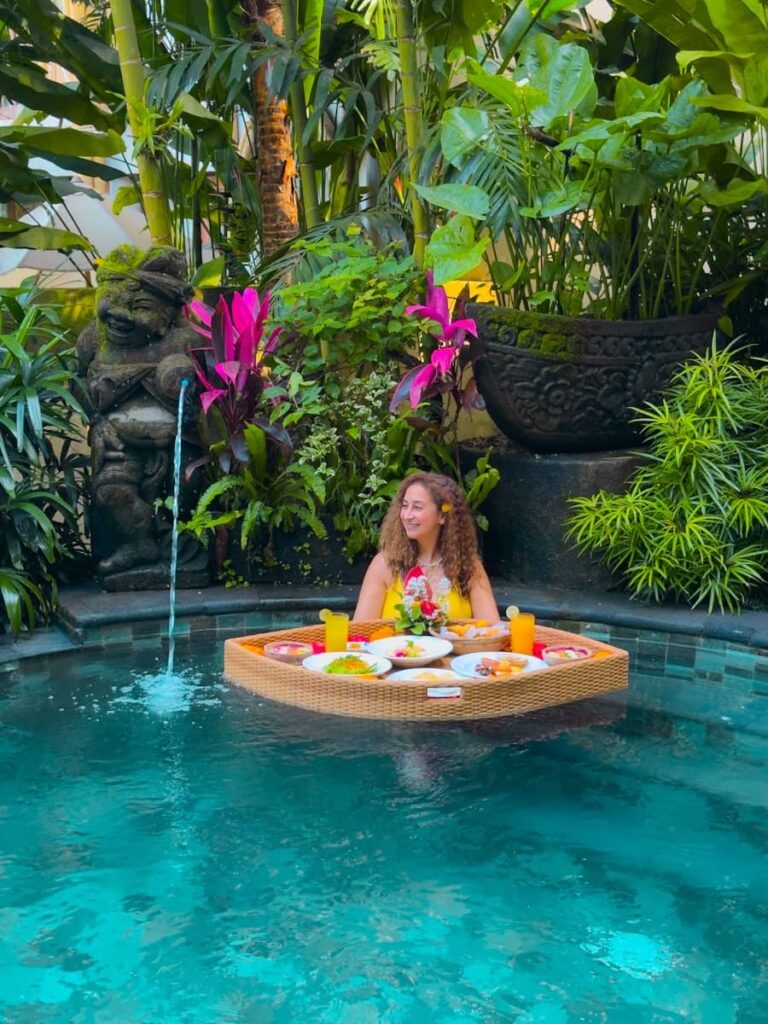 Sally with a floating breakfast in a private pool villa at The Udaya in Ubud, Bali