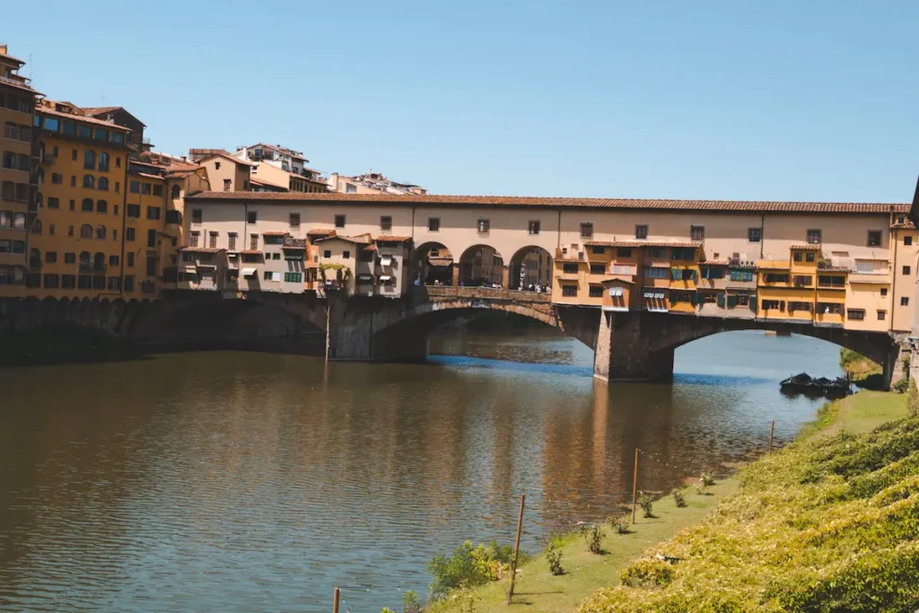 ridge over Arno River in Florence Italy at sunset.